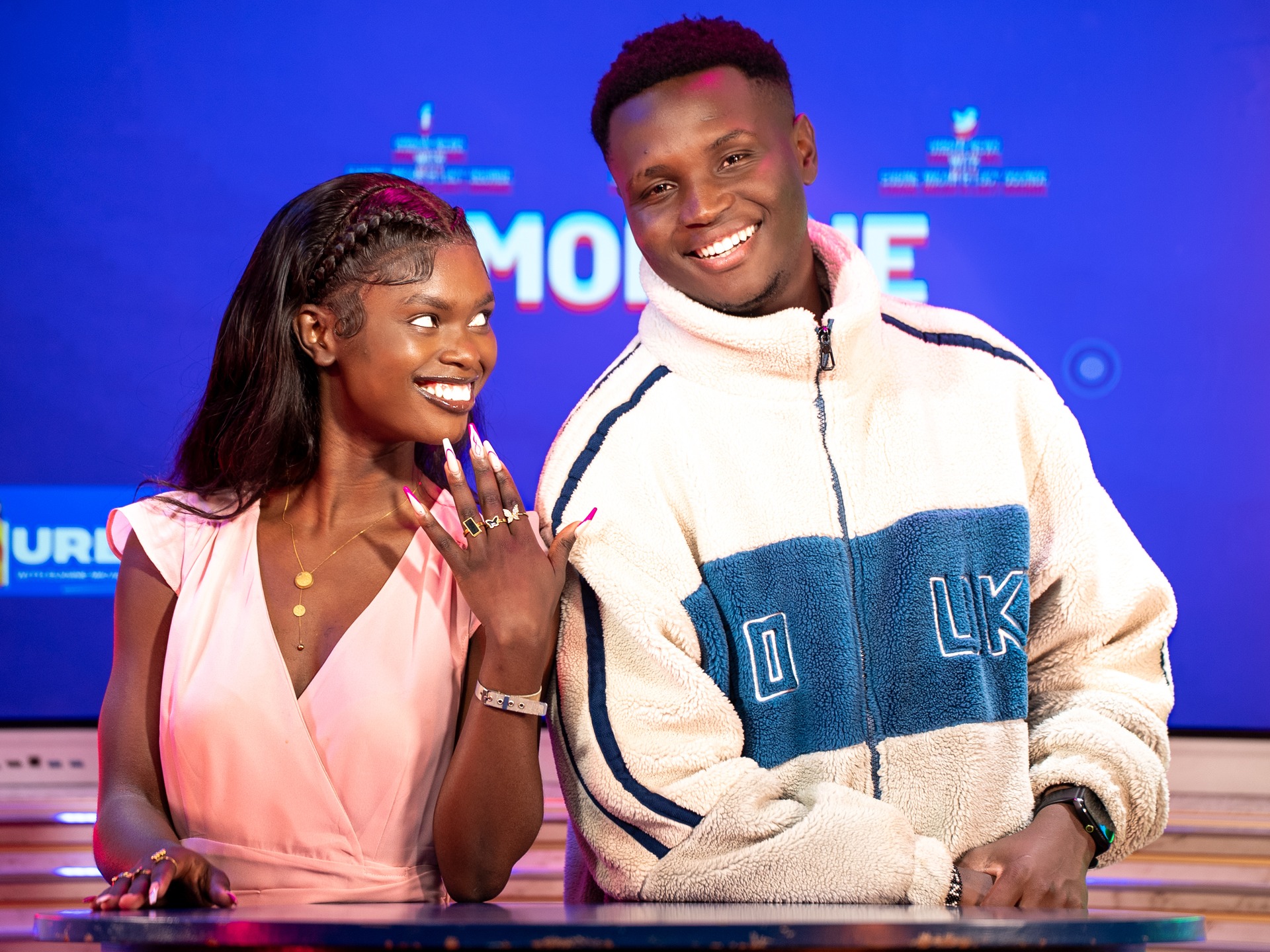 Eugine Micah on the Urban News desk, with Lucy Ogunde